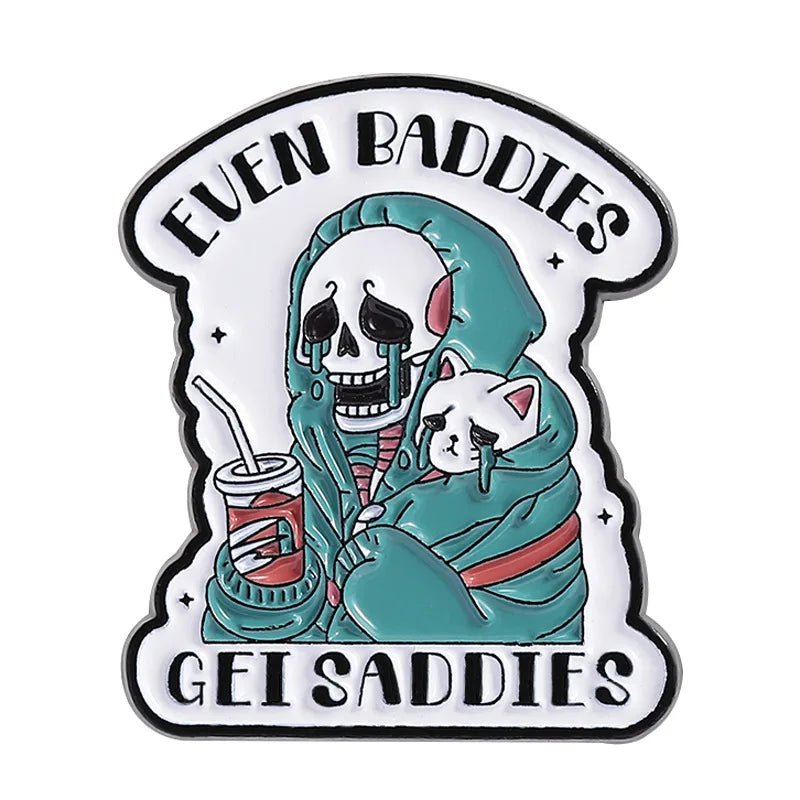 Cartoon skeleton holding a cat with text 'Even Baddies Get Saddies' enamel badge