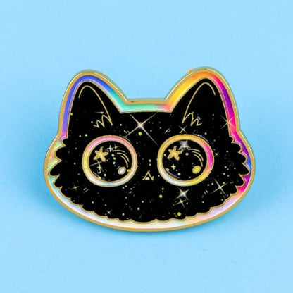 Black and rainbow cat-shaped pin with starry eye design 