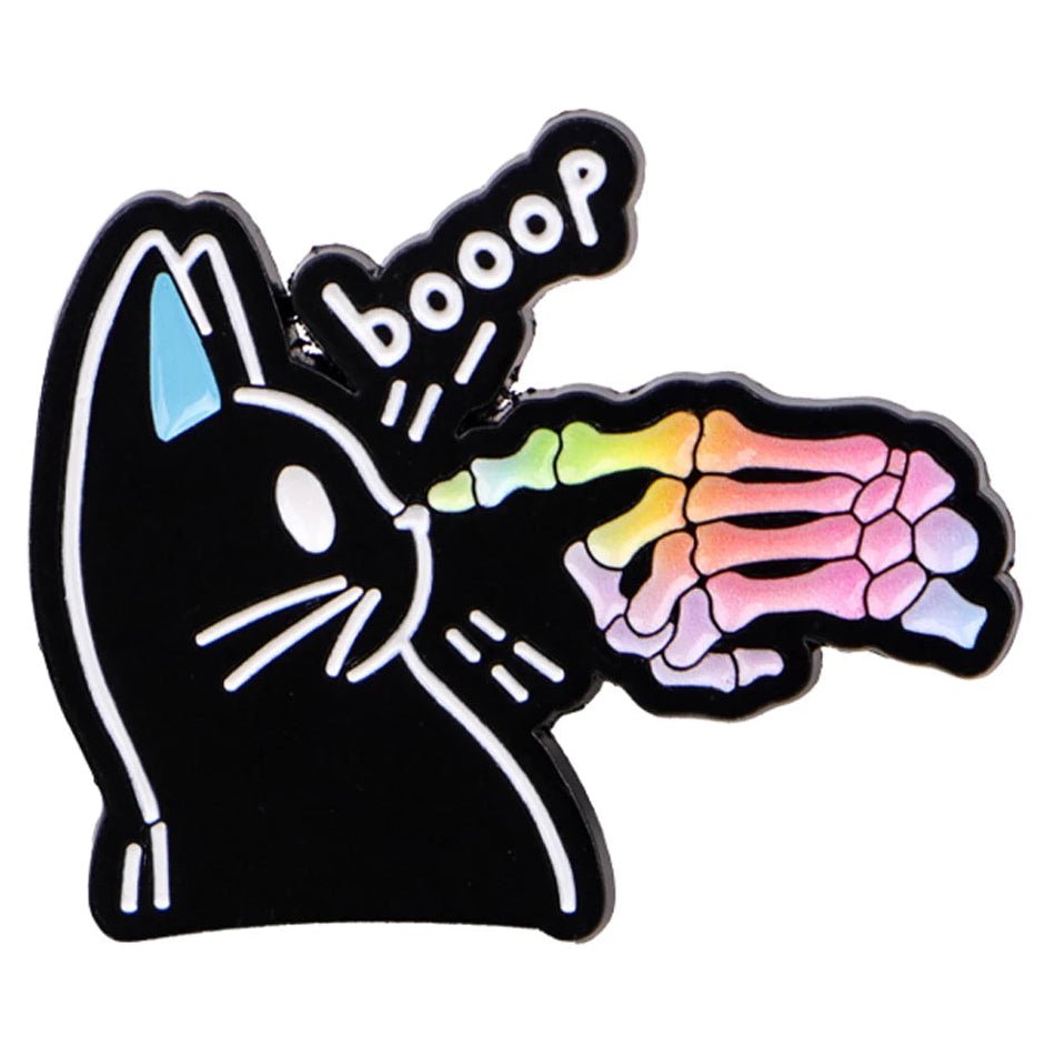 Black cat-shaped pin with rainbow skeleton and 'booop' text