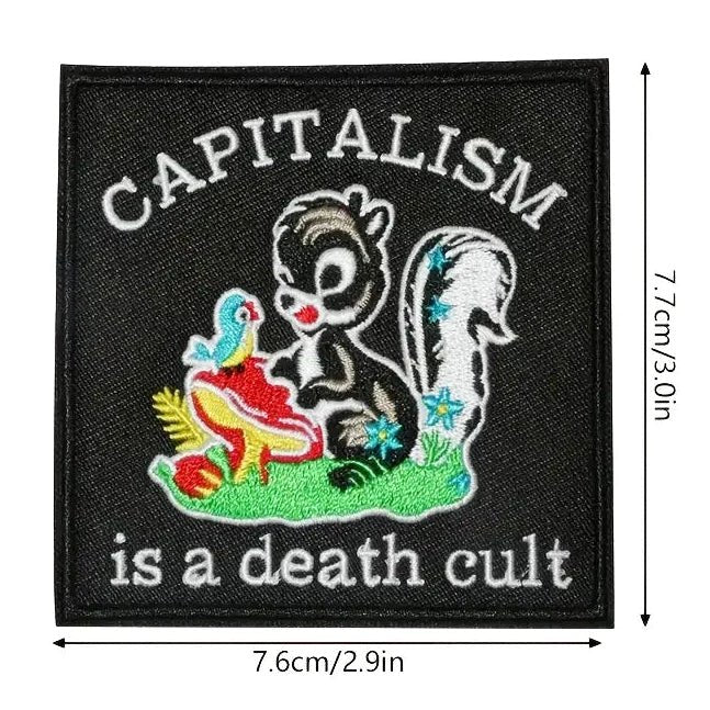 Patch with a skunk and text 'Capitalism is a death cult' 