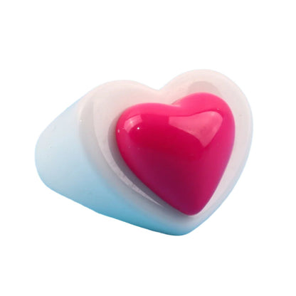 A stylish white acrylic ring by Gay Skate, from the Chunky Acrylic Sweet Heart Rings collection, showcases a vibrant pink love heart against a light blue background.