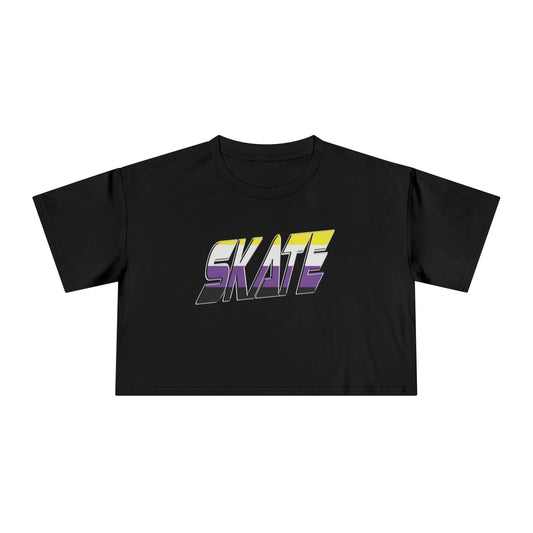 A black crop top with short sleeves from Gay Skate, featuring the word "SKATE" in bold, gradient letters across the front. The gradient transitions from yellow at the top to purple at the bottom, providing a vibrant and stylish look that proudly embraces non-binary skate culture. This unique tee is locally printed and known as the SKATE non-binary pride flag crop tee.