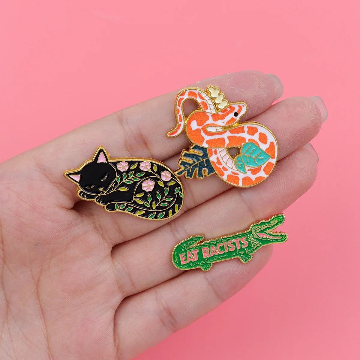 Green Crocodile Alligator pin that says Eat Racists. Anti-racist