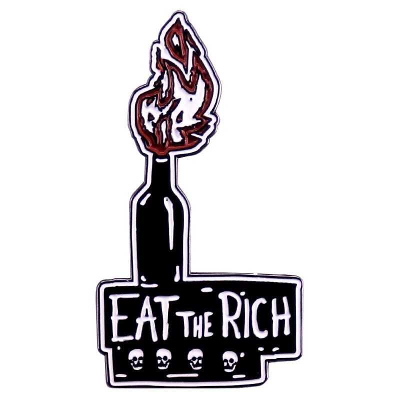 The "Eat The Rich - Enamel Pin" features a Molotov cocktail with a flaming cloth and the words "Eat The Rich" below, enhanced by small cartoon skulls for a rebellious touch.