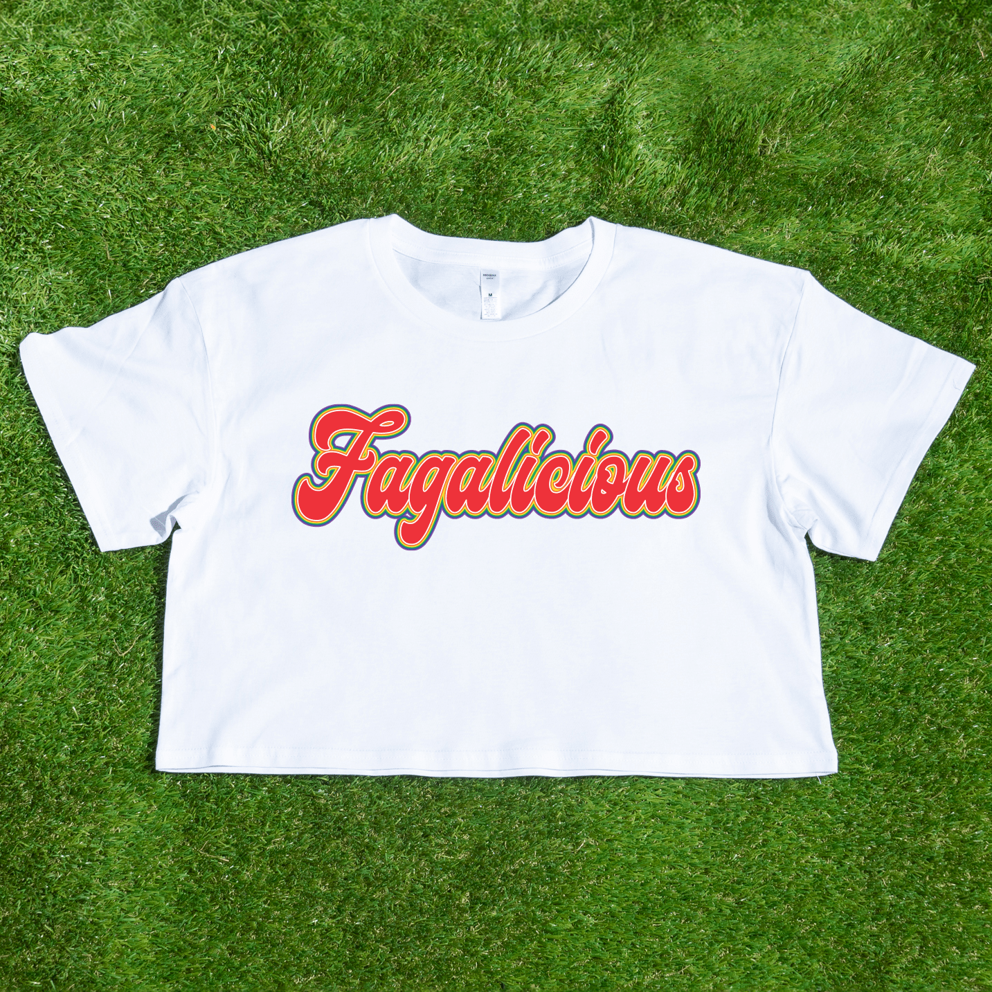 Gay pride white as colour crop t-shirt with 'Fagalicious' text in funky orange red writing.
