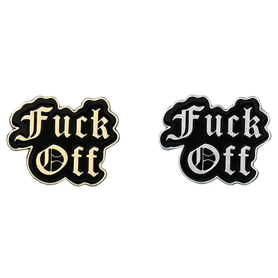Two black enamel lapel pins with the text 'Fuck Off' in a gothic font