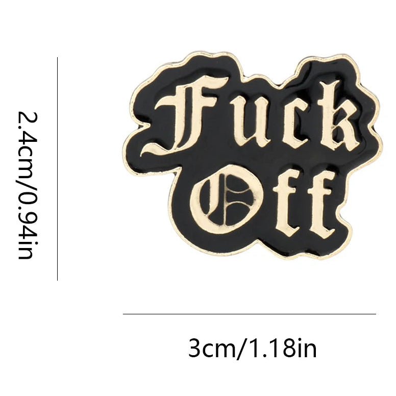 A black enamel pin with gold outline and gothic-style lettering reading 'Fuck Off' is shown on a white background