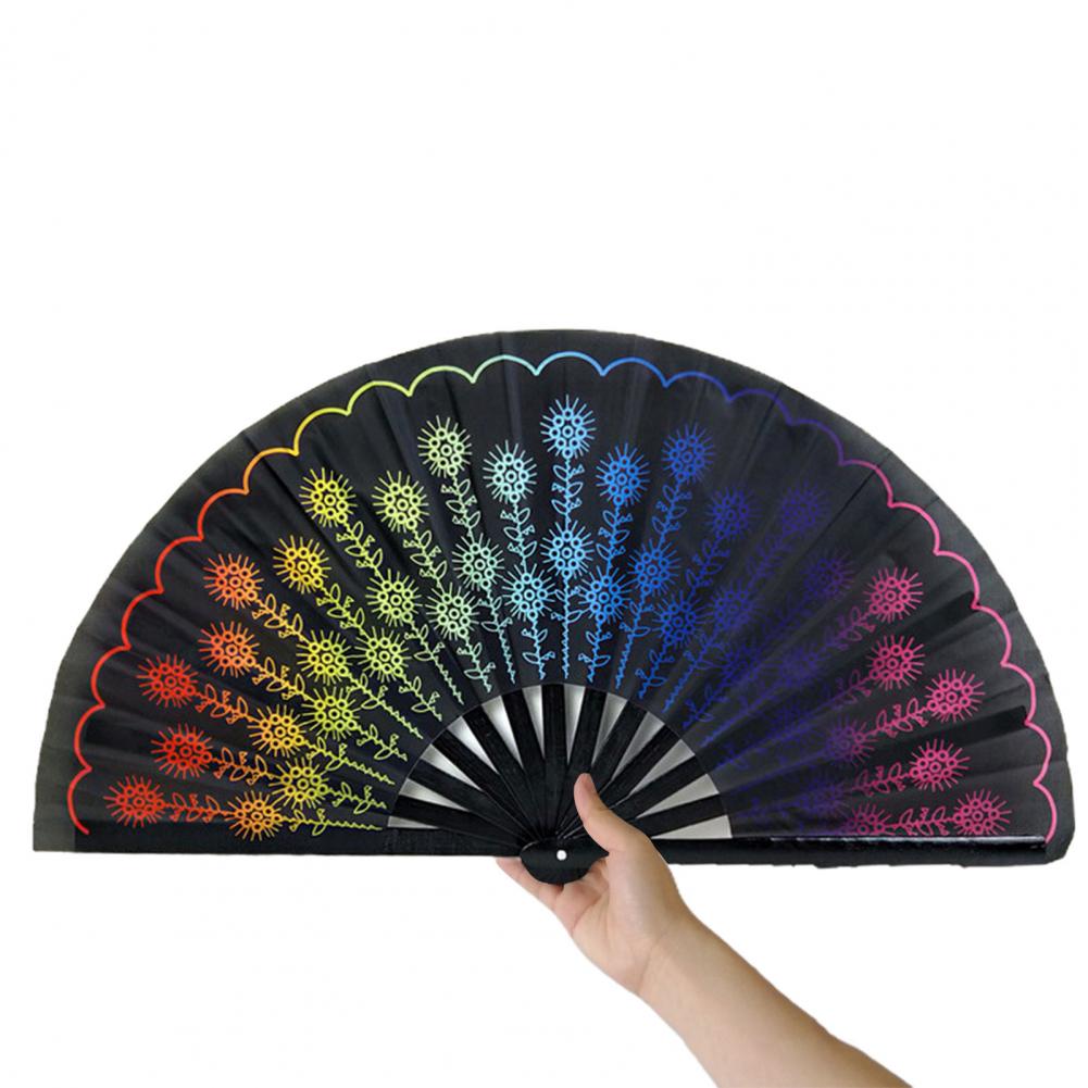 Rainbow flowers and black hand held fan