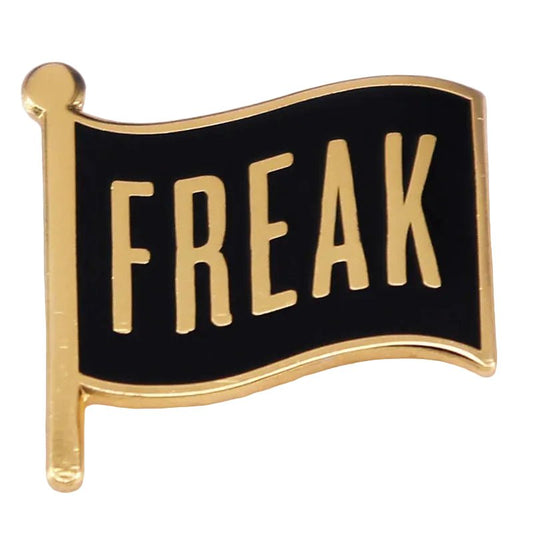 Black and gold border 'FREAK' enamel pin
