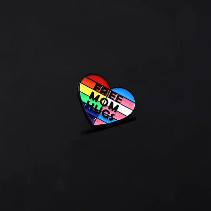 Free Mom Hugs rainbow and trans pride flag love heart badge