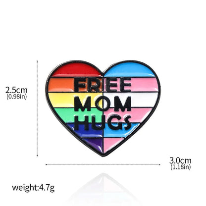 Free Mom Hugs rainbow and trans pride flag love heart badge