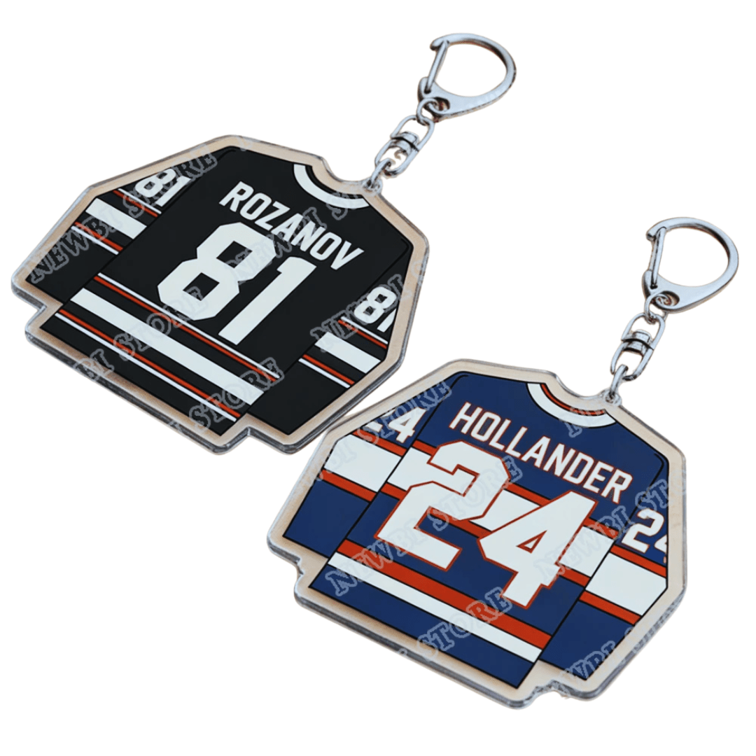 Heated Rivalry Two sports-themed keychains with Rozanov 81 and Hollander 24