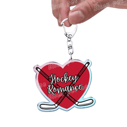 Red Love Heart-shaped keychain with 'Hockey Romance' text and crossed hockey - Heated Rivalry Fandom