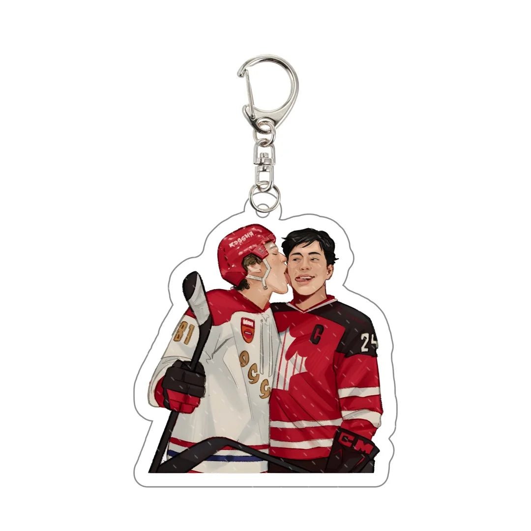 Heated Rivalry Keychain with illustration of two hockey players Shane and Ilya in red and white jerseys on a white background