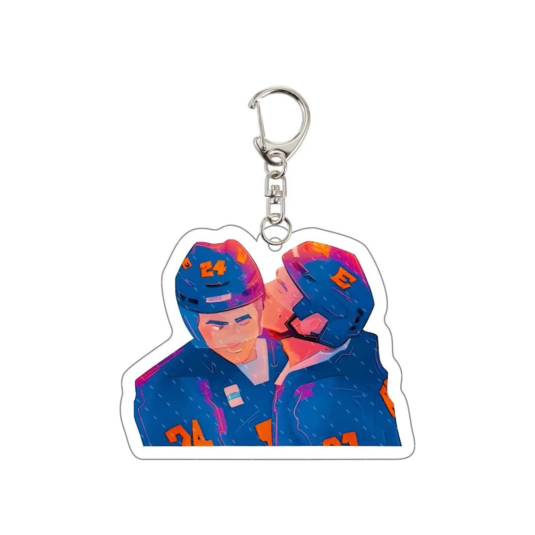 Heated Rivalry Keychain with two hockey players in blue uniforms on a white background
