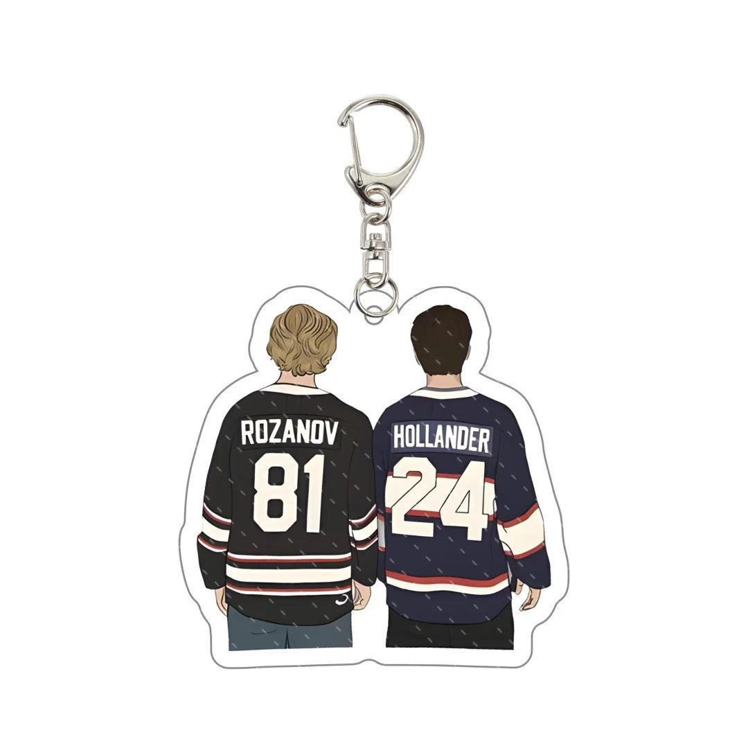 Heated Rivalry Keychain with illustrations of two hockey players wearing jerseys Rozanov 81 Hollander 4