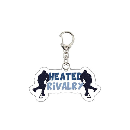 Keychain with 'Heated Rivalry' text and hockey silhouette design 