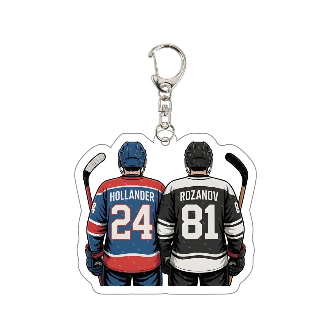 Keychain with illustrations of two hockey players in jerseys with names and numbers Hollander 24 Rozanov 81
