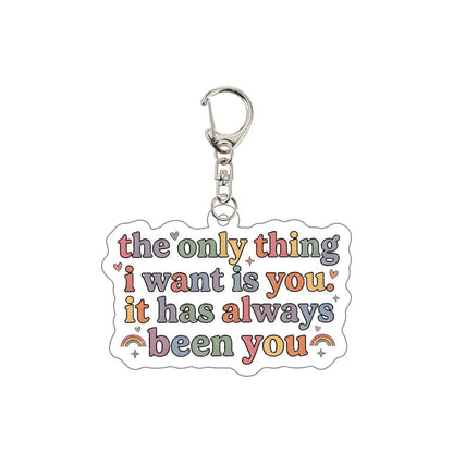 Heated Rivalry rainbow Keychain with colorful text 'the only thing I want is you. It has always been you'