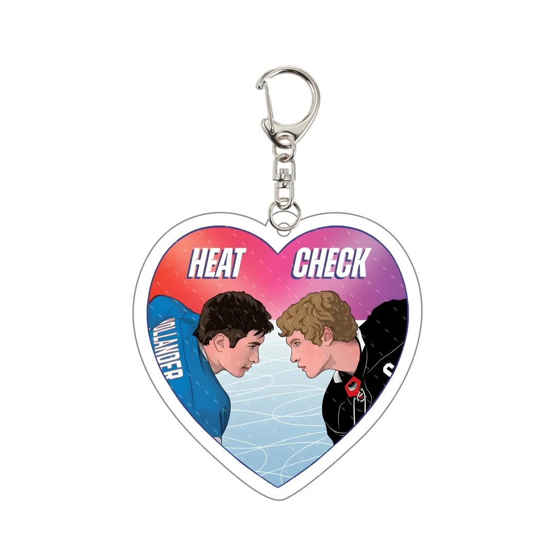 Heated Rivalry Heart-shaped keychain with Hollander and Rozanov facing each other and text 'HEAT CHECK' 
