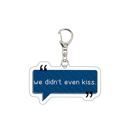 Heated Rivalry Keychain with blue speech bubble saying 'we didn't even kiss'