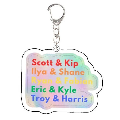 Heated Rivalry Keychain with rainbow text: Scott and Kip, Ilya and Shane, Ryan and Fabrian, Eric and Kyle, Troy and Harris