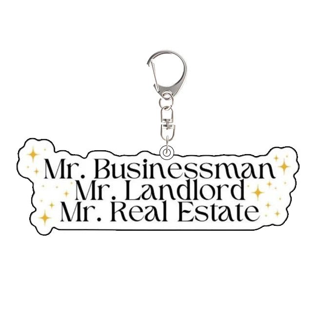 Keychain with text 'Mr. Businessman, Mr. Landlord, Mr. Real Estate' on a white background