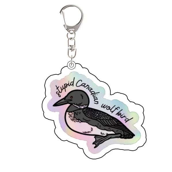 Heated Rivalry Keychain with a loon design and text: Stupid Canadian Wolf Bird