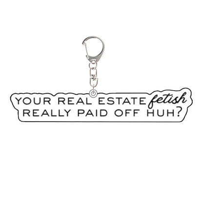 Heated Rivalry Keychain with humorous text 'Your real estate fetish really paid off huh?' 
