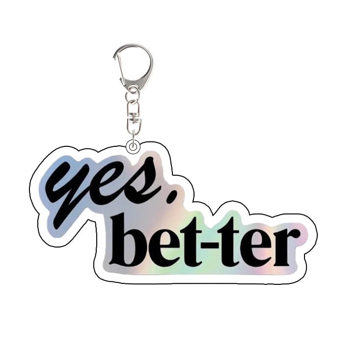 Heated Rivalry Keychain with 'yes. bet-ter' text on a white background