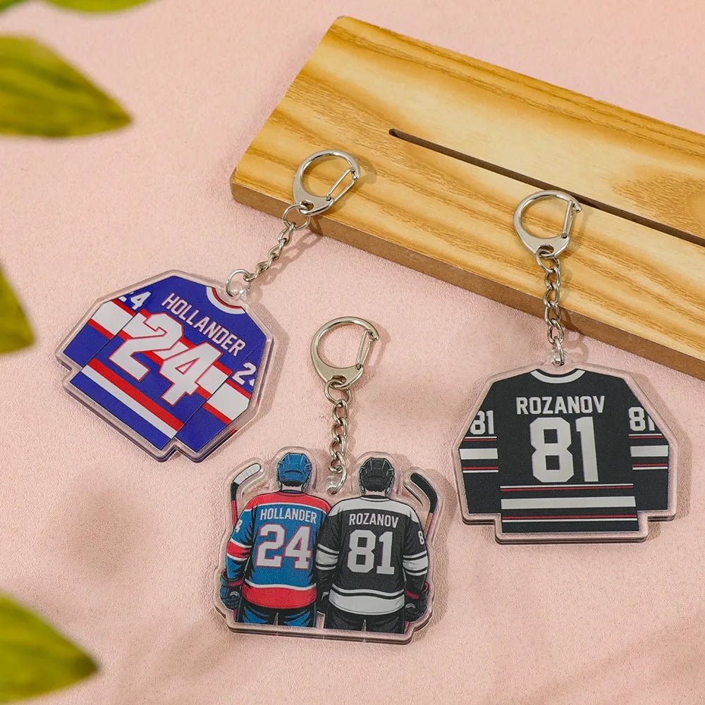 Heated Rivalry hockey jersey keychains with numbers and names. Hollander 24, Rozanov 81 and a Shane and Ilya couple keyring with hockey sticks 
