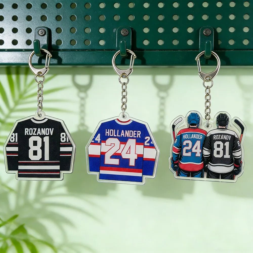 Heated Rivalry hockey jersey keychains with numbers and names. Hollander 24, Rozanov 81 and a Shane and Ilya couple keyring with hockey sticks 