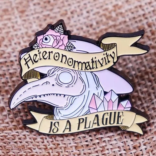 Pin with gothic plague doctor design and text 'Heteronormativity is a Plague'. LGBTIQ pride badge