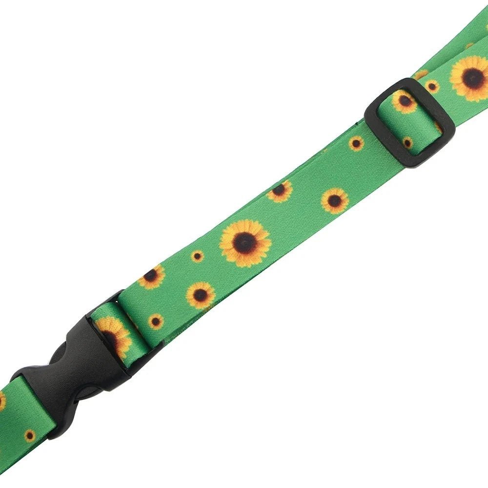 Hidden Disability Sunflowers Green Lanyard featuring a yellow sunflower pattern