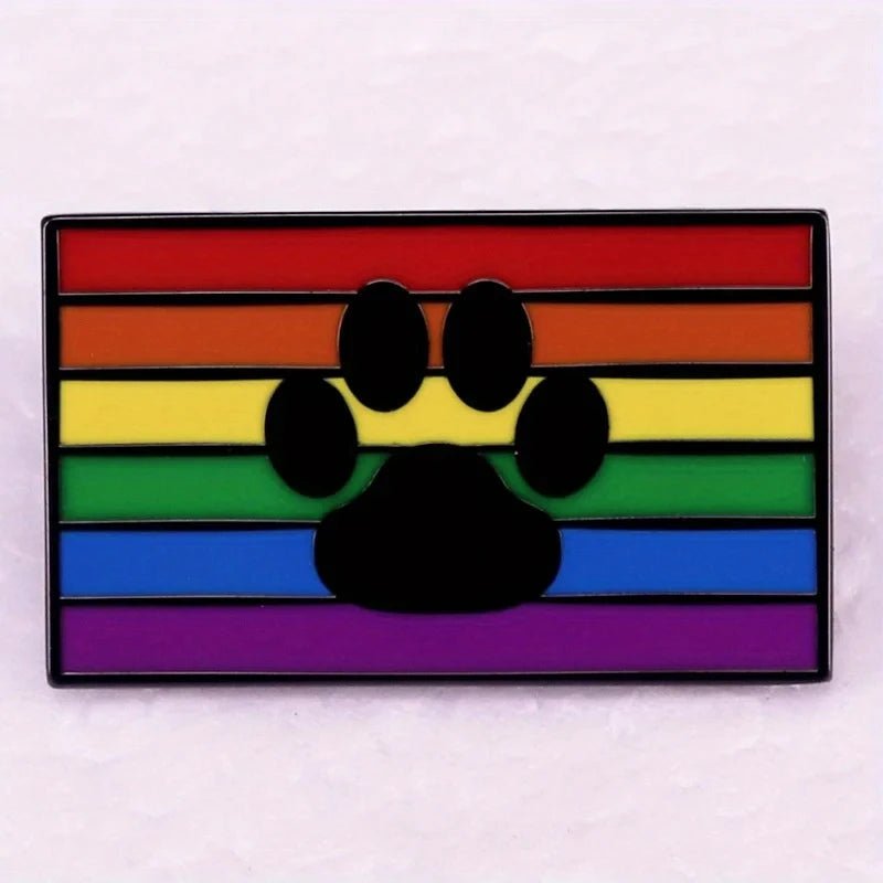 Rainbow flag with black paw prints on a white background