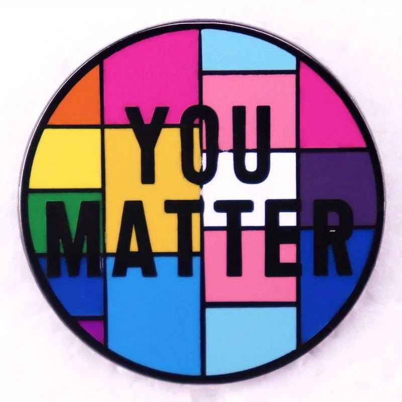 Colorful pride flags badgve with 'YOU MATTER' text. Rainbow, pansexual, transgender, bisexual flag