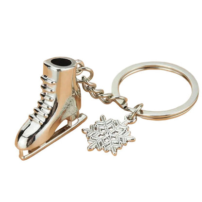 Silver ice skate and snowflake keychain 