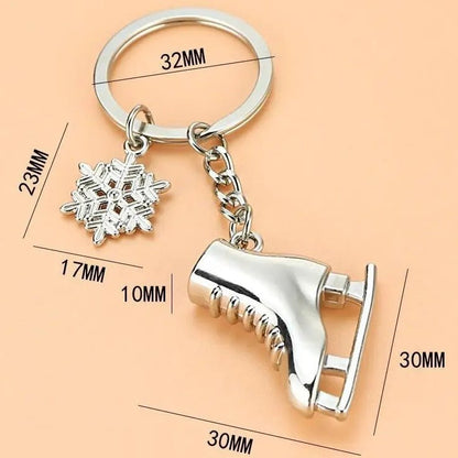 Silver keychain with snowflake charm and 