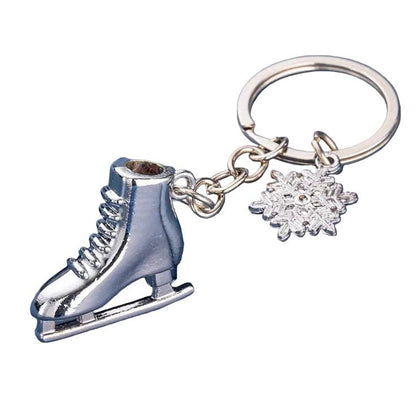 Silver ice skate keychain with a snowflake charm