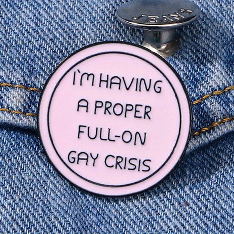 Pink button with text 'I'm having a proper full-on gay crisis'. Heated Rivalry