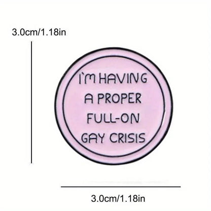 Pink circular badge with text 'I'm having a proper full-on gay crisis' from Heated Rivalry