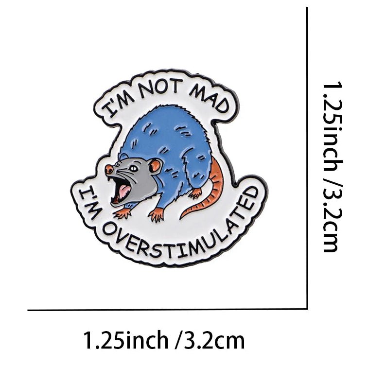 Badge with an angry blue possum and text 'I'm not mad, I'm overstimulated' with dimensions