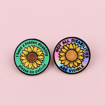 Two pins with sunflower designs and text Not all disabilities are visiible, I have a hidden disability please be patient