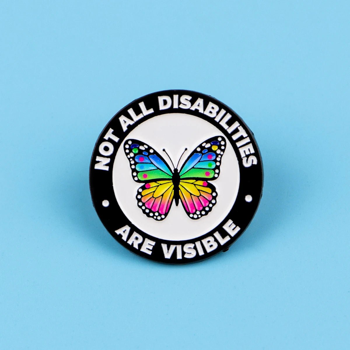 Button badge with butterfly illustration and text 'Not all disabilities are visible'