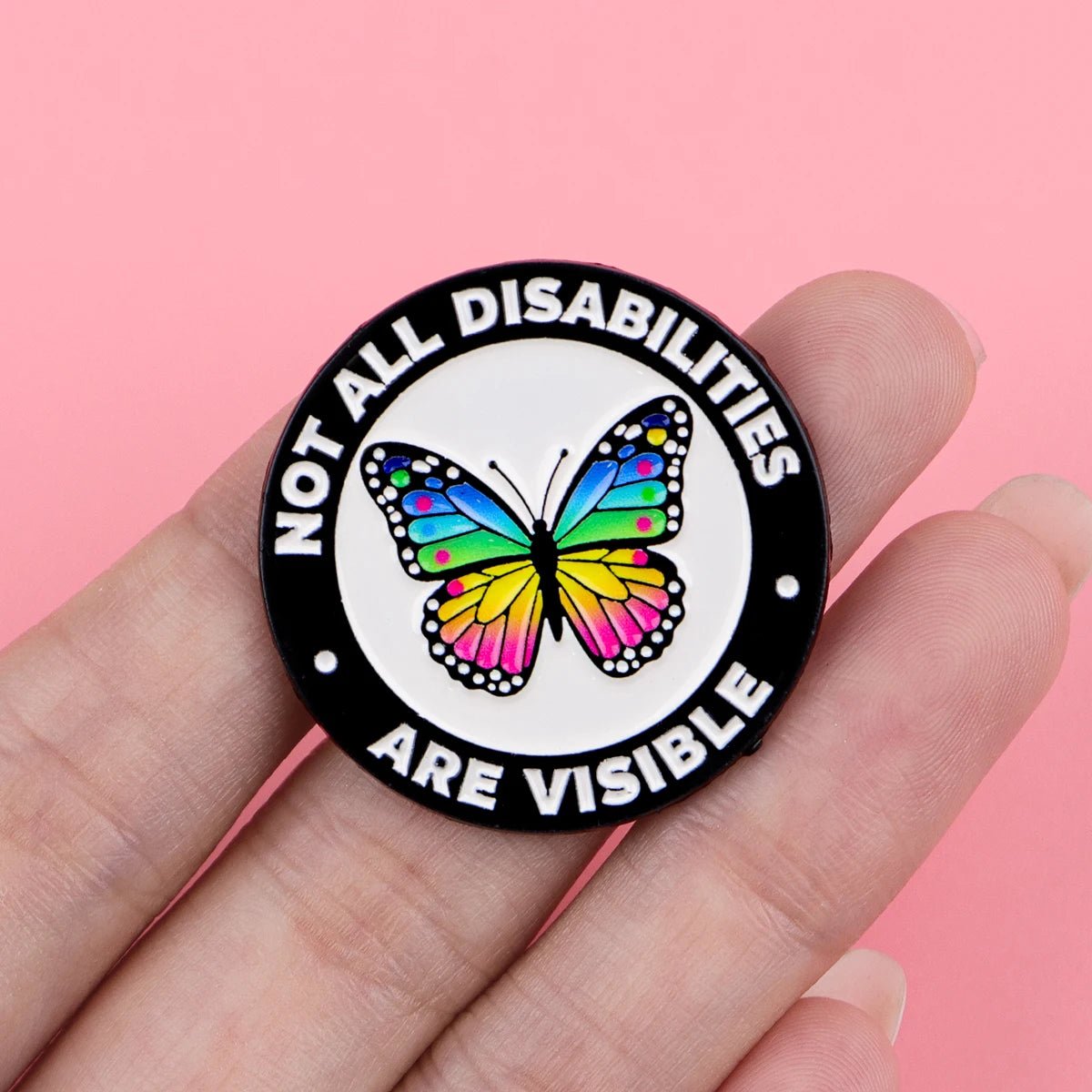 Pin with butterfly design and text 'Not all disabilities are visible' 