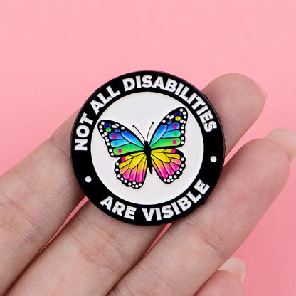 Pin with butterfly design and text 'Not all disabilities are visible' 