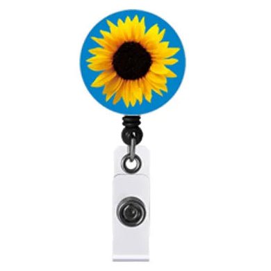 A retractable badge reel with invisible disability sunflower on a blue background