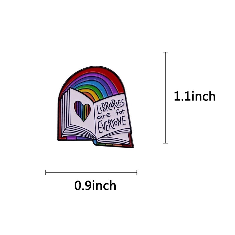 The "Libraries Are For Everyone" rainbow enamel pin, measuring 1.1" x 0.9", features an open book with a rainbow heart cutout, celebrating the inclusive spirit of libraries.