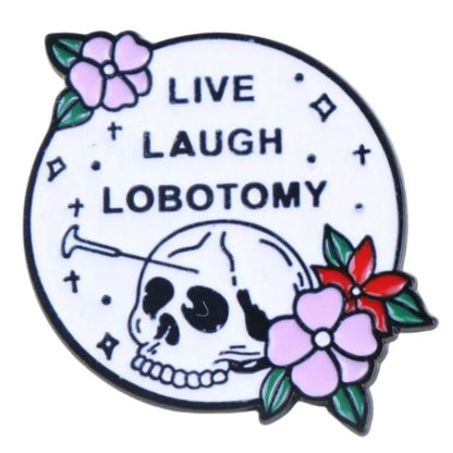 Enamel pin with skull design, flowers, and 'Live Laugh Lobotomy' text 