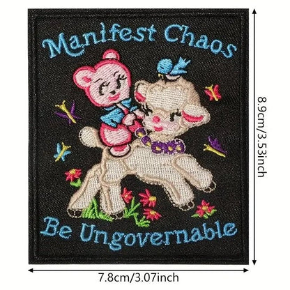 Embroidered patch with cartoon characters and text 'Manifest Chaos Be Ungovernable' on a black background, with measurements displayed.